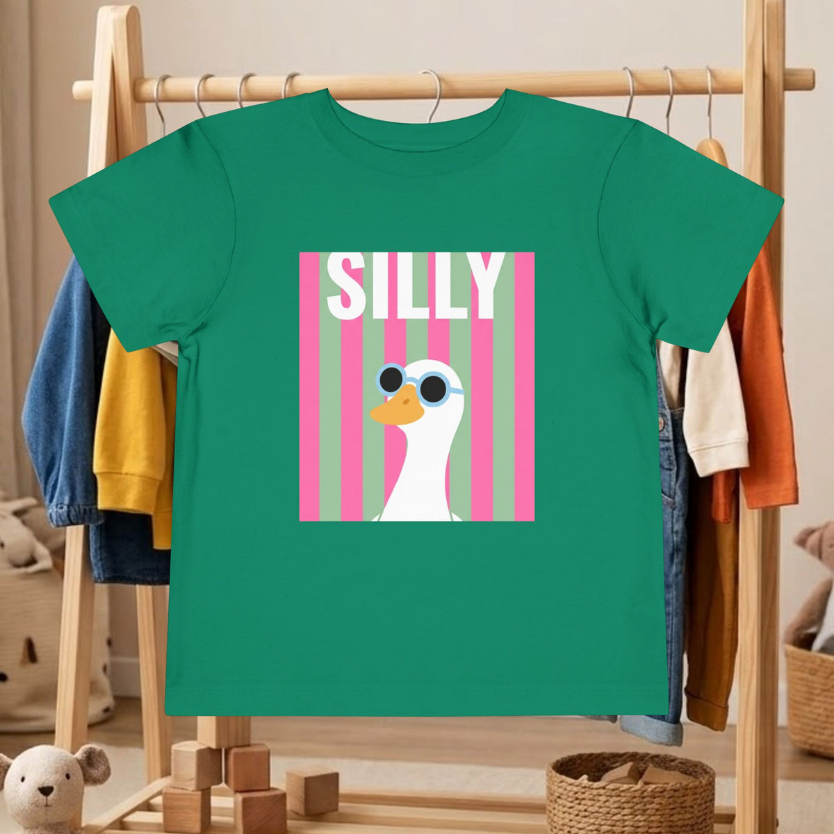 Toddler green tee with “SILLY” and duck wearing sunglasses graphic