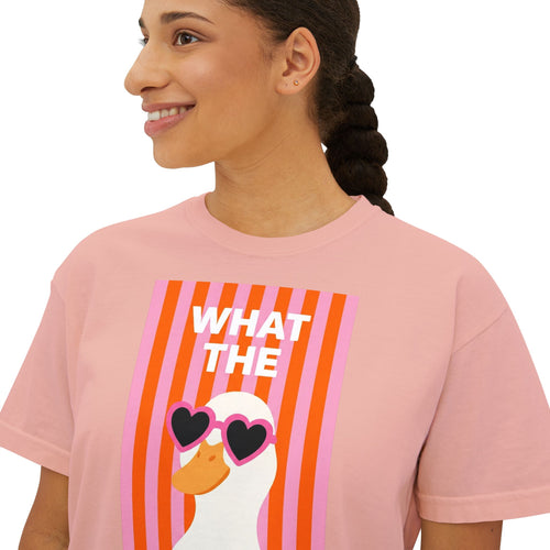 Pink crew-neck graphic tee with “WHAT THE” text and duck wearing heart glasses