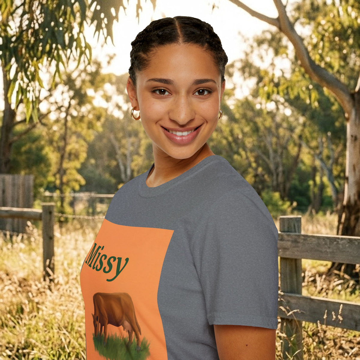 Dark gray t-shirt with orange Missy panel and grazing cow graphic, crew neck