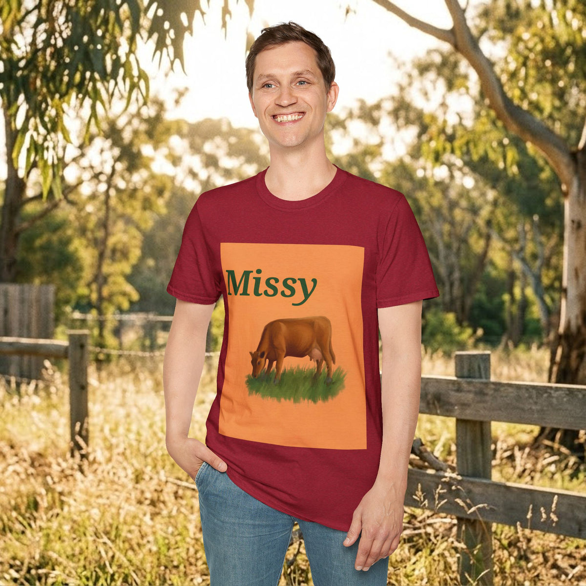 Maroon crewneck T-shirt with orange Missy graphic panel and cow illustration