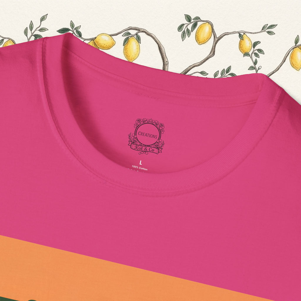 Pink crewneck t-shirt close-up of neckline with small chest logo
