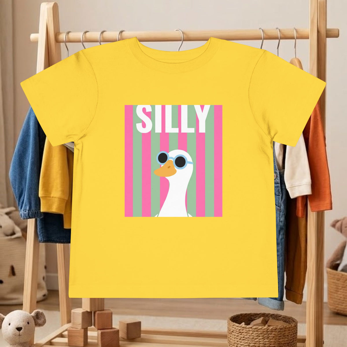 Toddler yellow tee with “SILLY” and duck wearing sunglasses graphic
