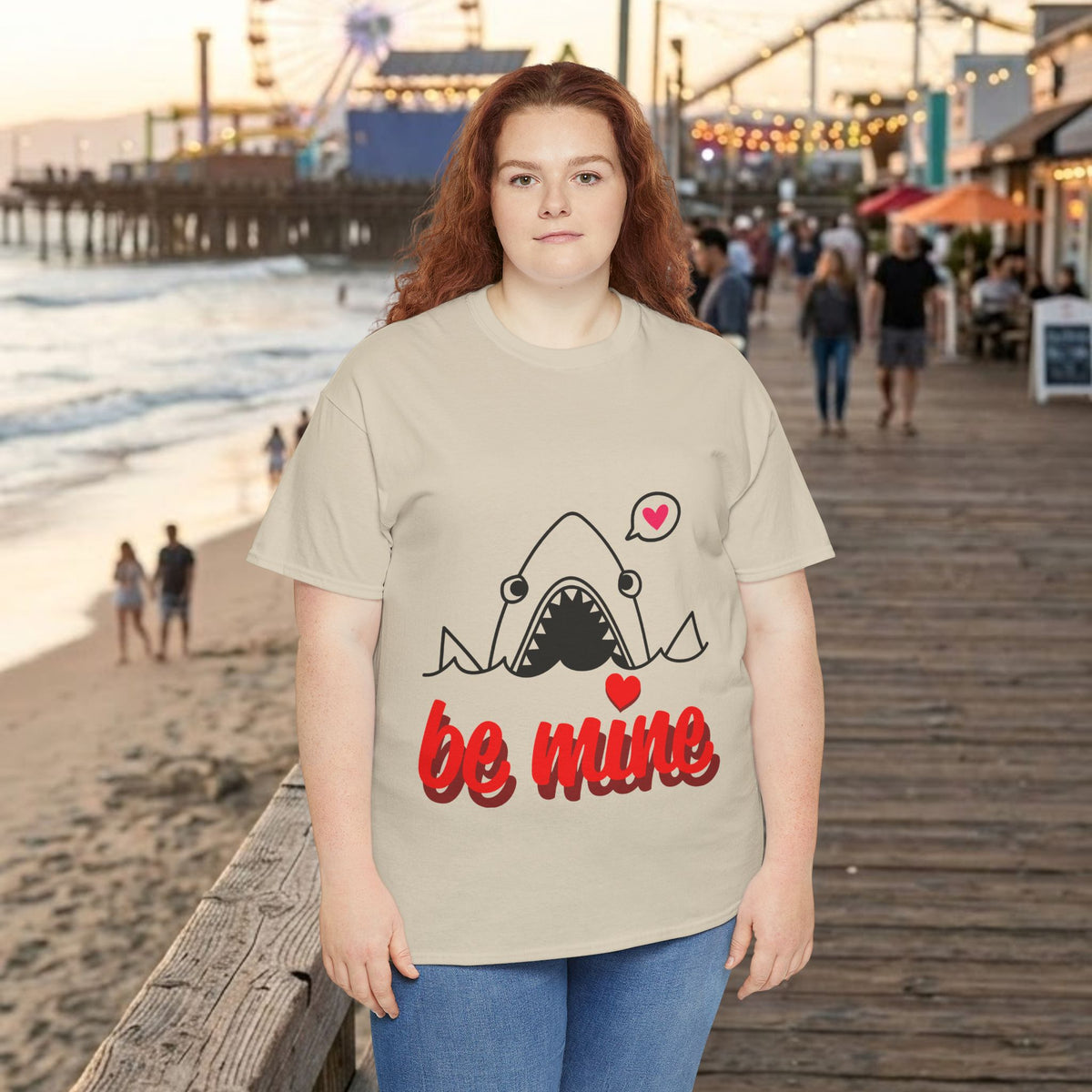 Natural T-shirt with shark graphic, small hearts, and red “be mine” slogan