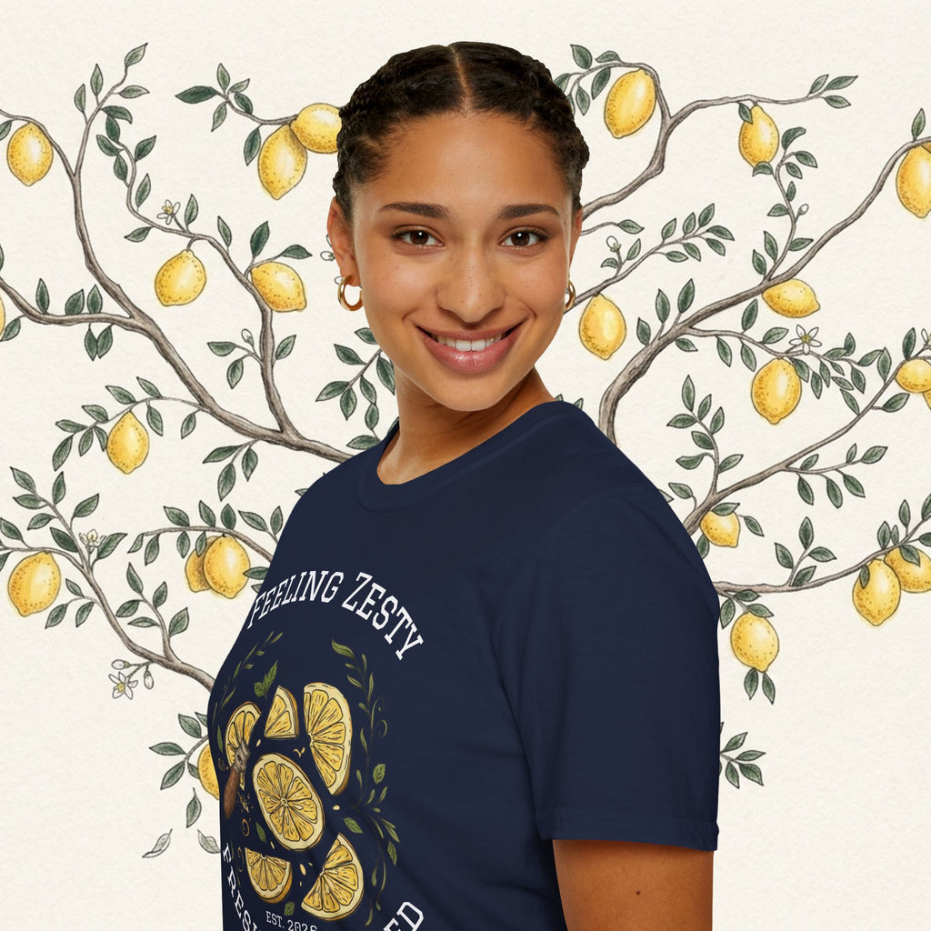 Navy lemon slice graphic tee on person, chest text and citrus artwork