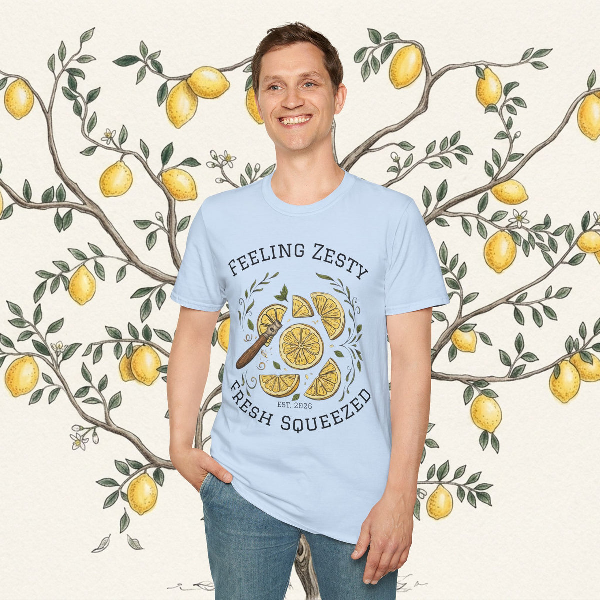 Light blue crewneck graphic tee with centered citrus slice design and "FRESH SQUEEZED"