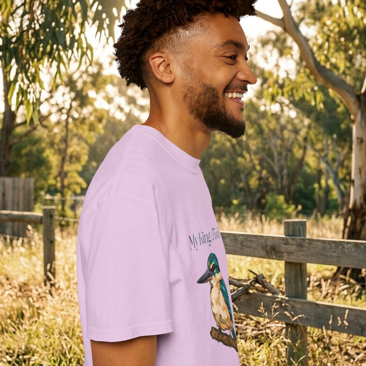 Lavender short-sleeve T-shirt with kingfisher bird graphic on front, side view.