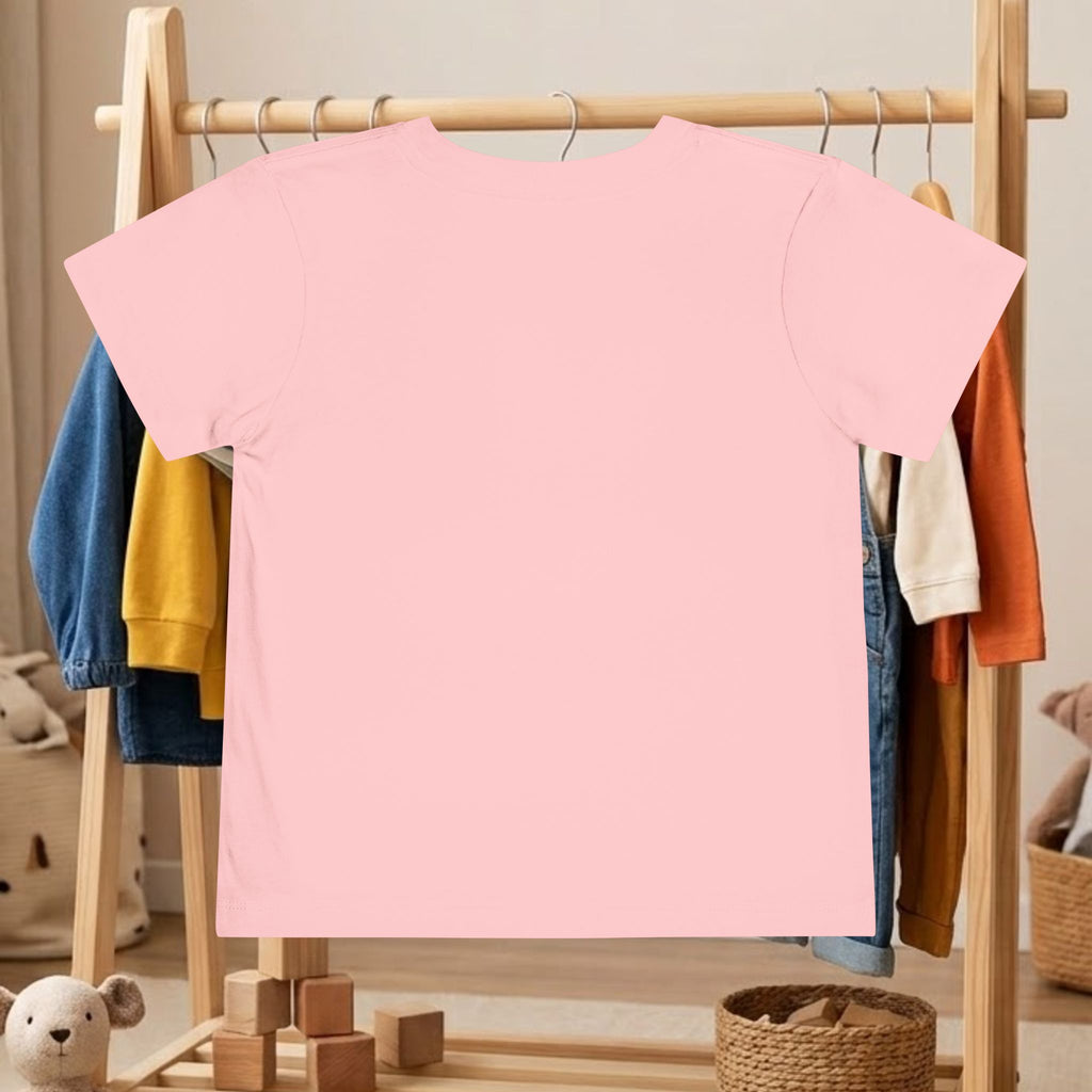 Toddler tee, pink short-sleeve shirt on hanger with plain front and no visible graphic
