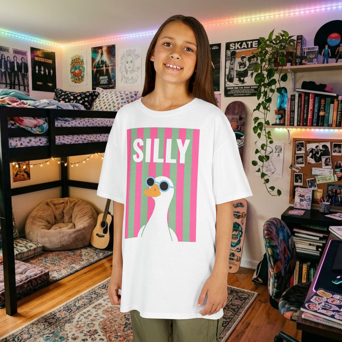Kids white T-shirt with front “SILLY” duck graphic print, worn by a child