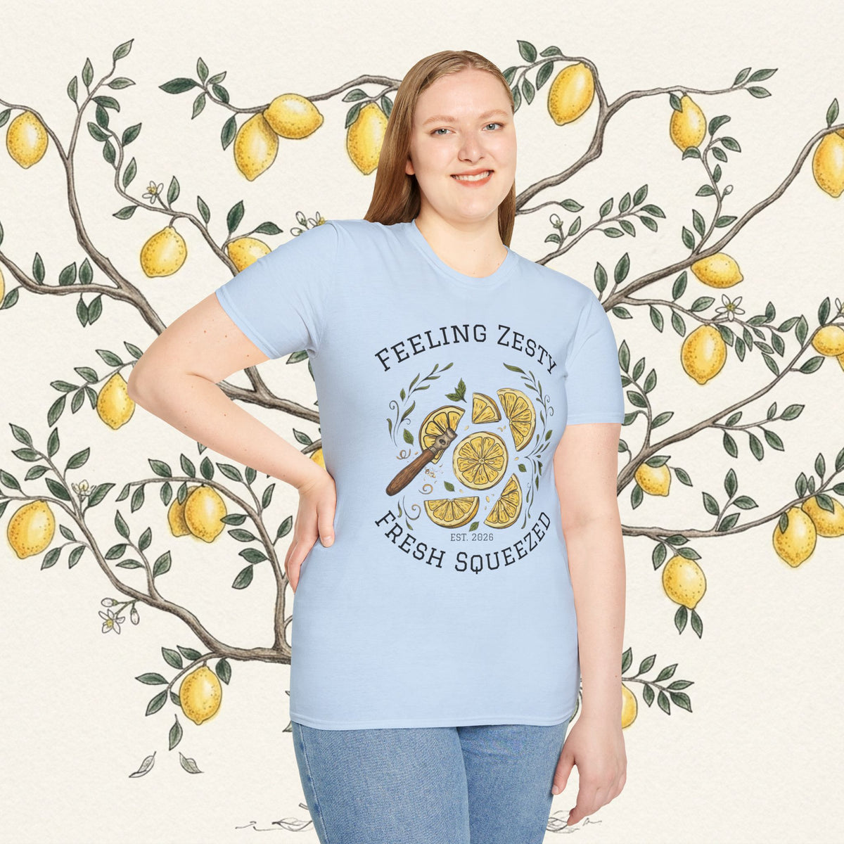 Light blue crewneck graphic tee with citrus slice illustration and "FRESH SQUEEZED"