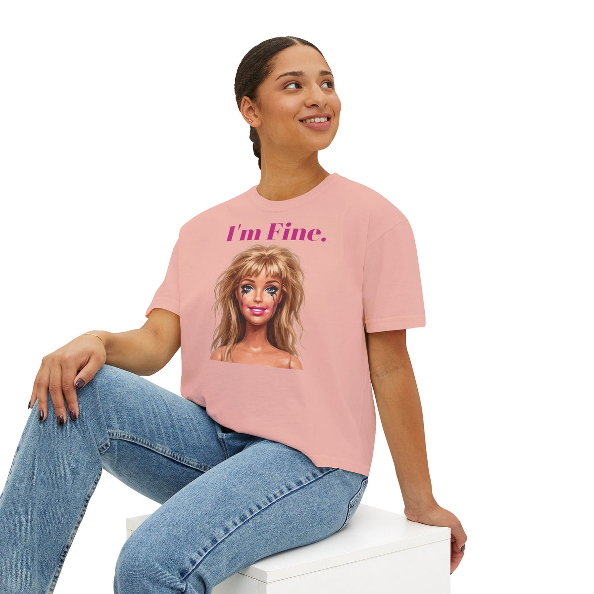 Boxy dusty pink graphic T-shirt with “I’m Fine.” lettering and doll face print, short sleeves