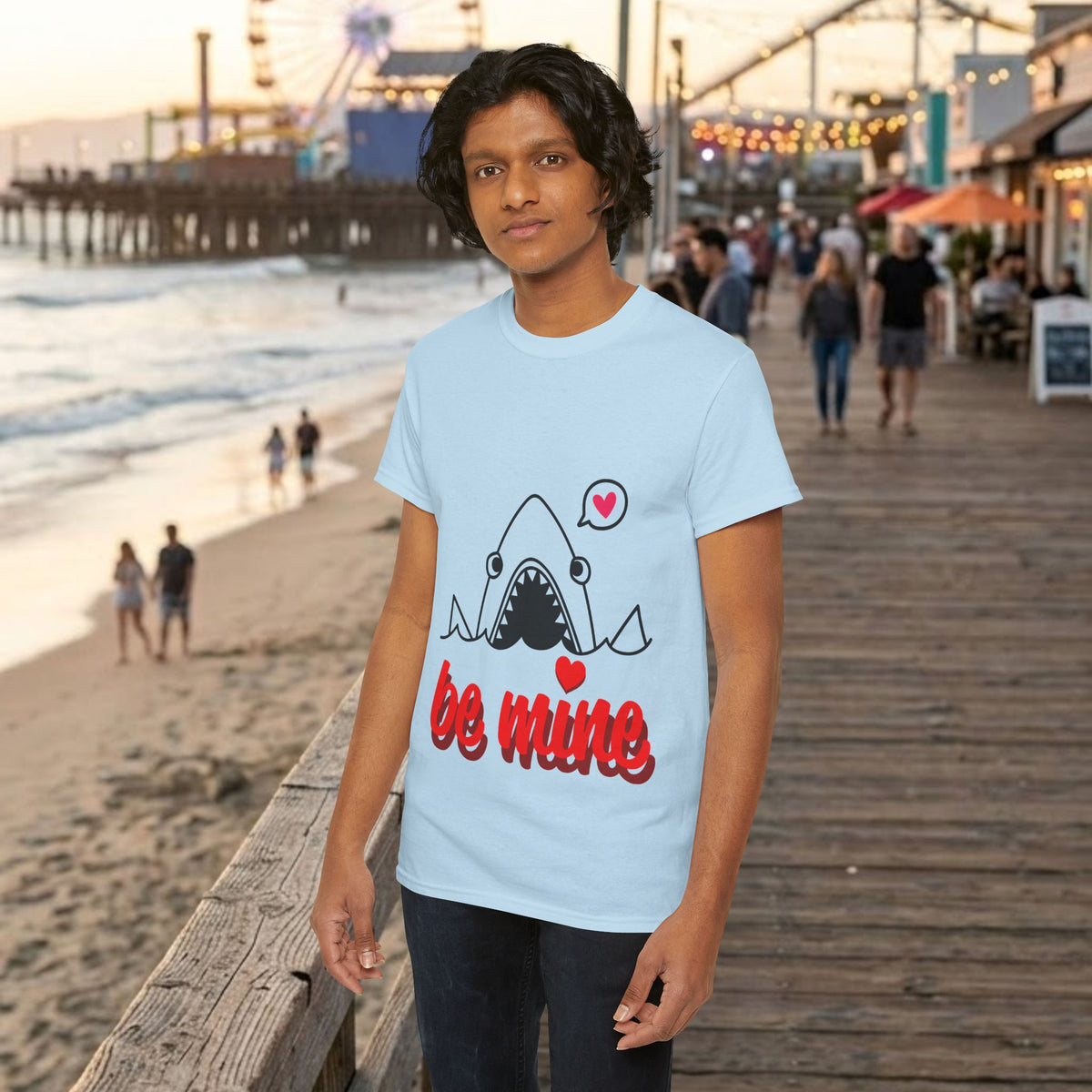 Light blue T-shirt with cartoon shark and red “be mine” graphic on the chest