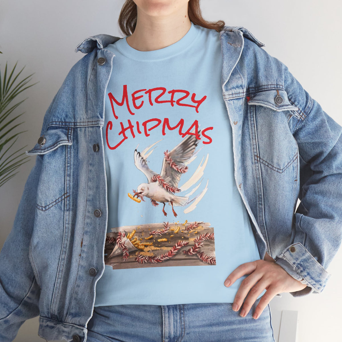 Light blue tee with red “Merry Chipmas” seagull illustration and matching graphic panel