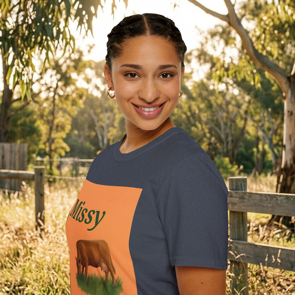 Navy crew-neck T-shirt with partial orange Missy text and grazing cow graphic