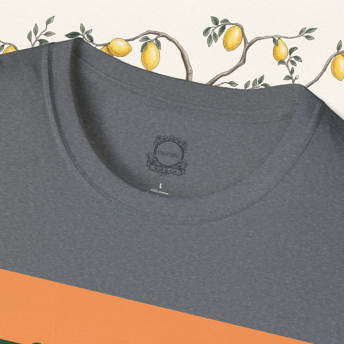 Charcoal crew-neck t-shirt collar detail with small logo patch at chest