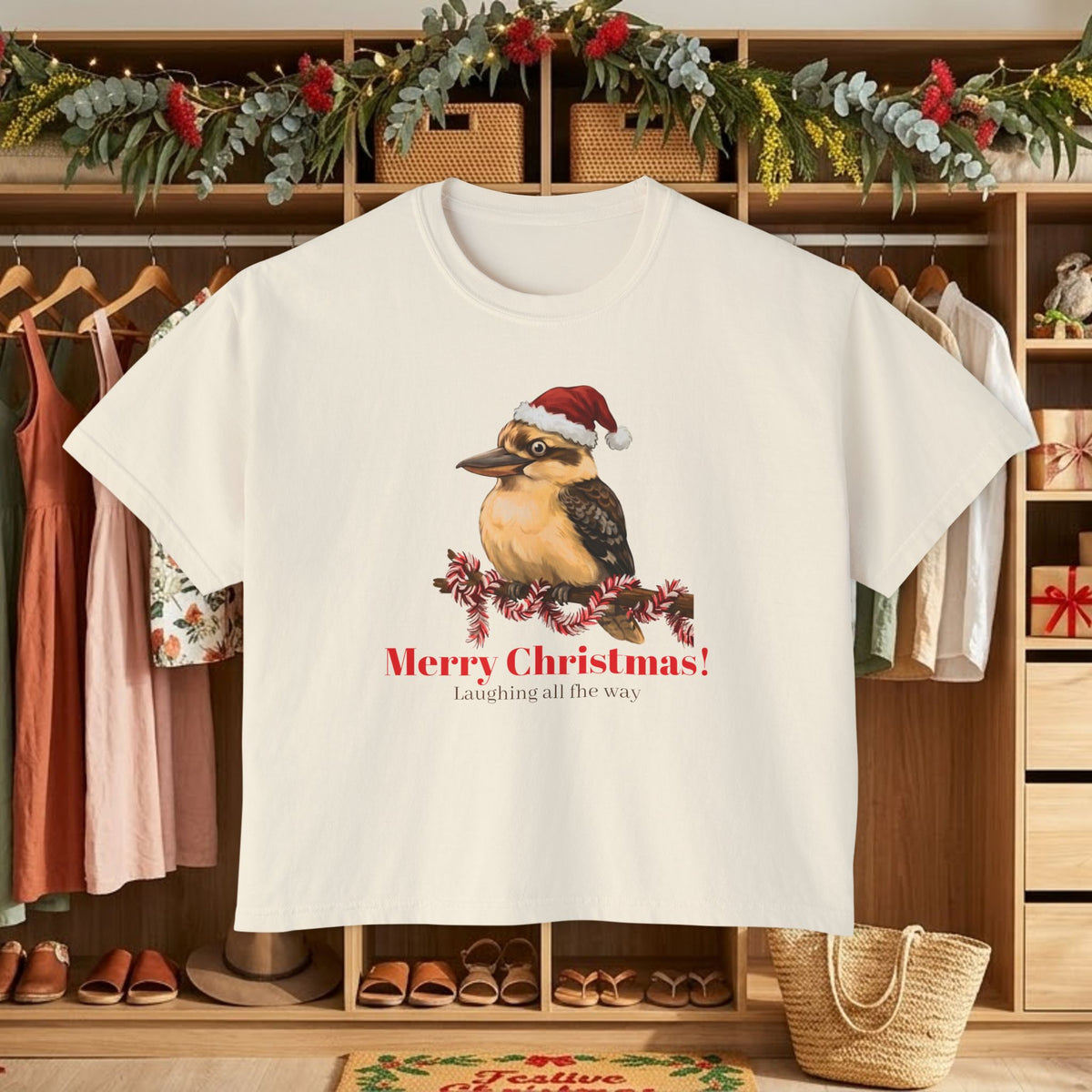 White graphic t-shirt with Santa-hat bird and “Merry Christmas!” front print