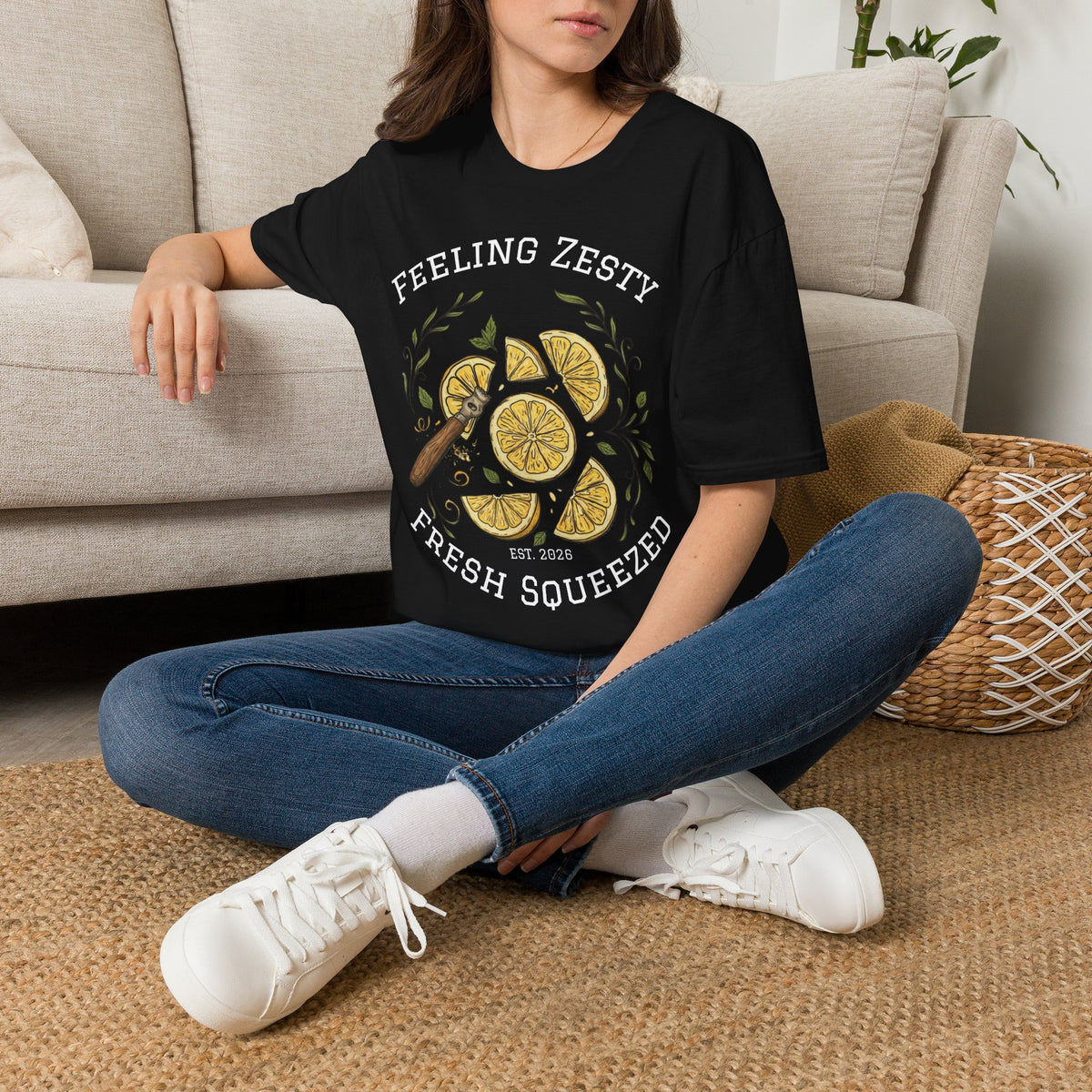 Black crew-neck graphic tee worn with lemon slice artwork and “FRESH SQUEEZED” text