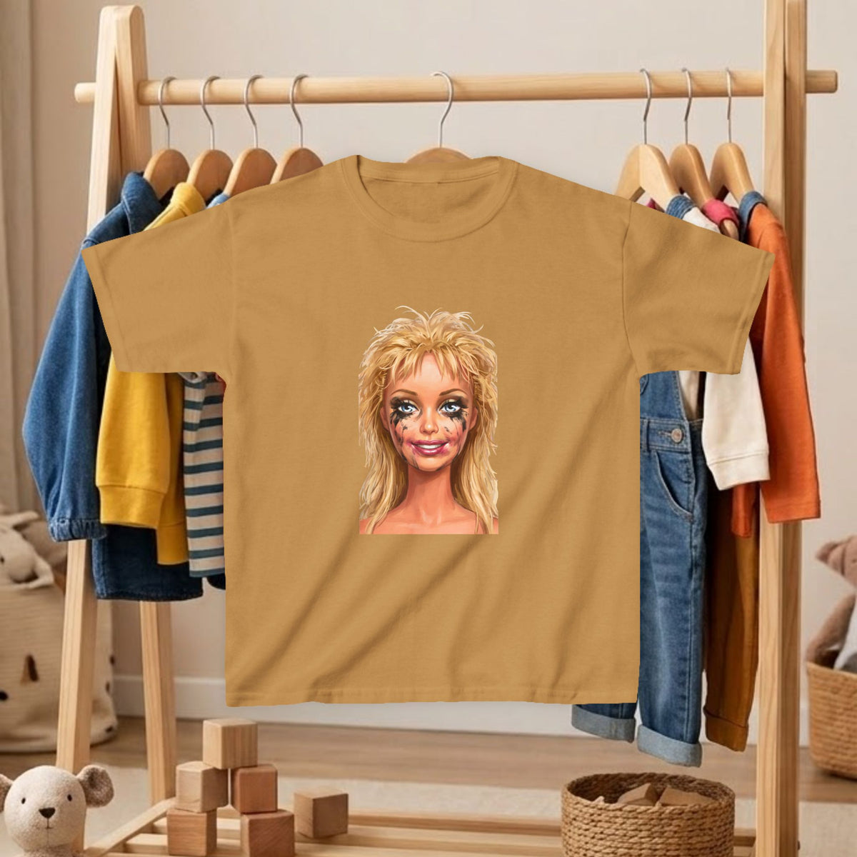 Kids' T-shirt in tan with blonde doll portrait graphic on front