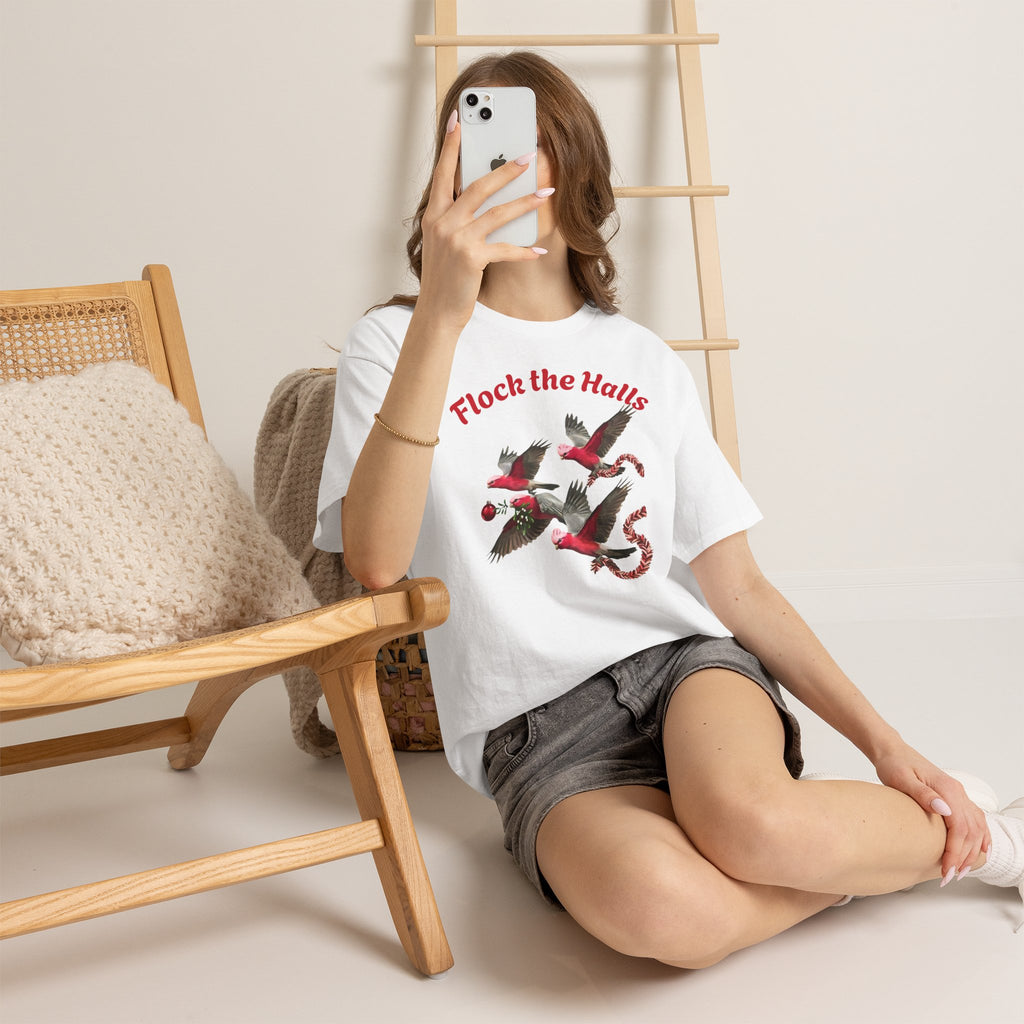 White crew-neck T-shirt with cardinal graphic and red “Flock the Halls” lettering