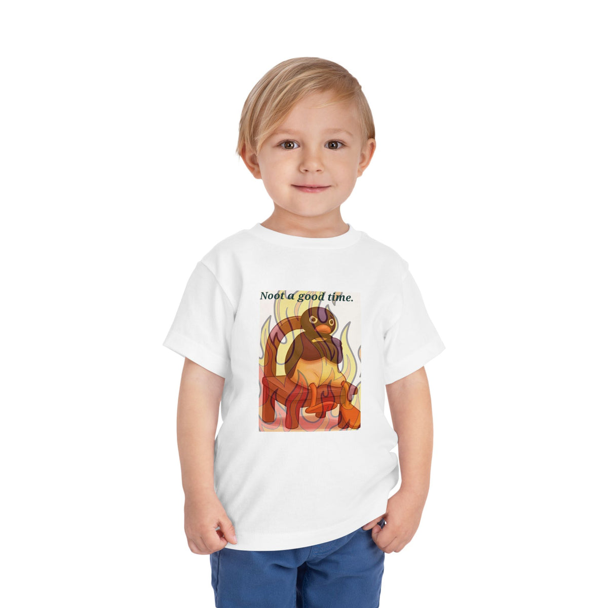 White toddler T-shirt on child, featuring cat-in-flames graphic and text