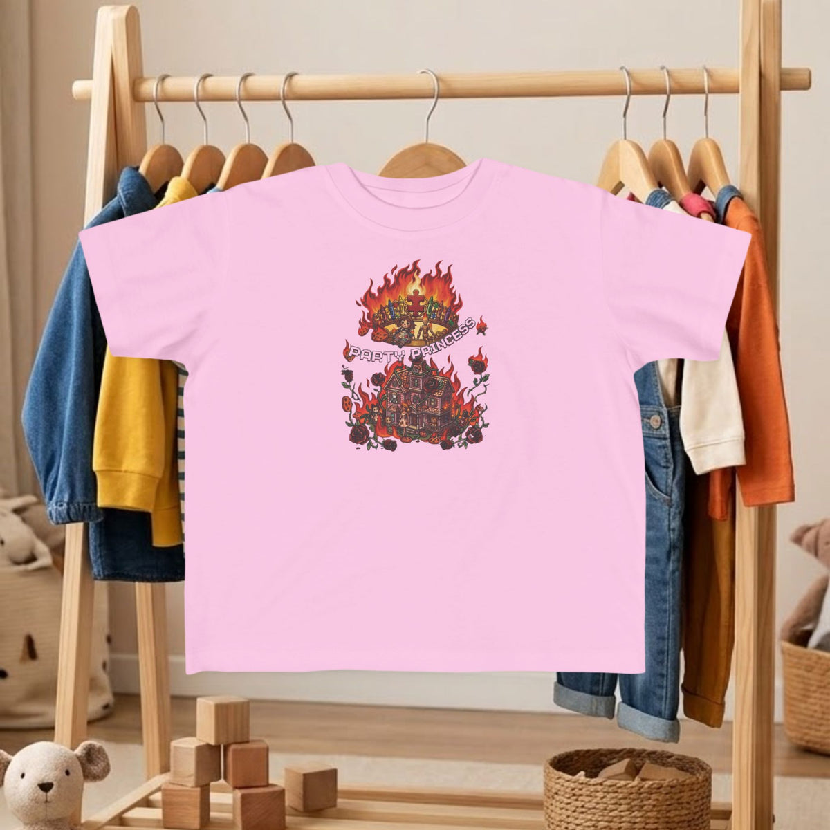 Toddler tee in pink with colorful fire graphic and medieval ruins illustration