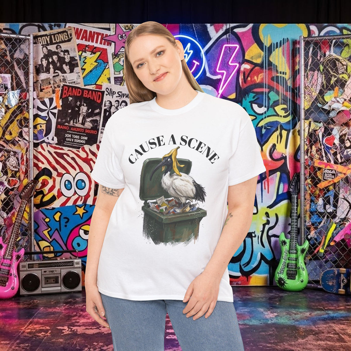 White t-shirt with “CAUSE A SCENE” ibis graphic in a trash can, crew neck style