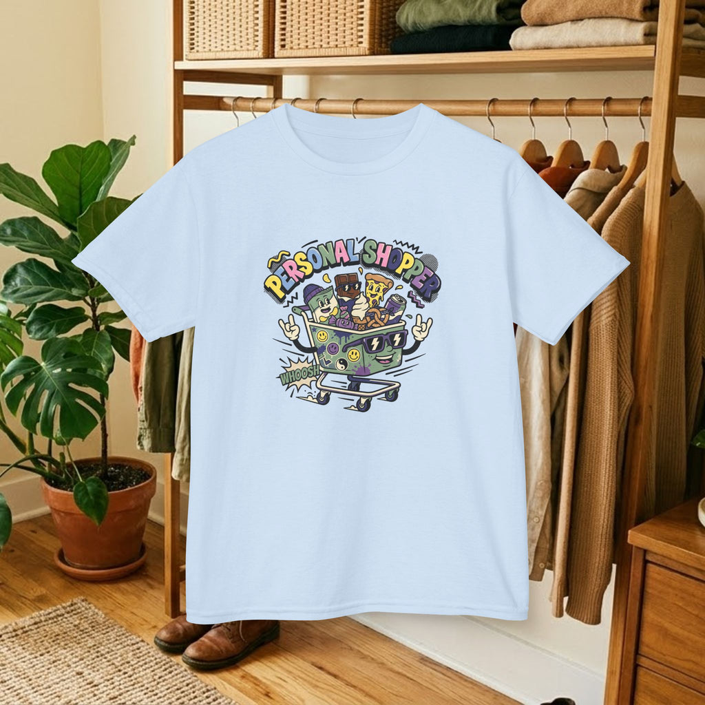 Kids light blue graphic tee with colorful “Personal Shopper” cartoon print, front