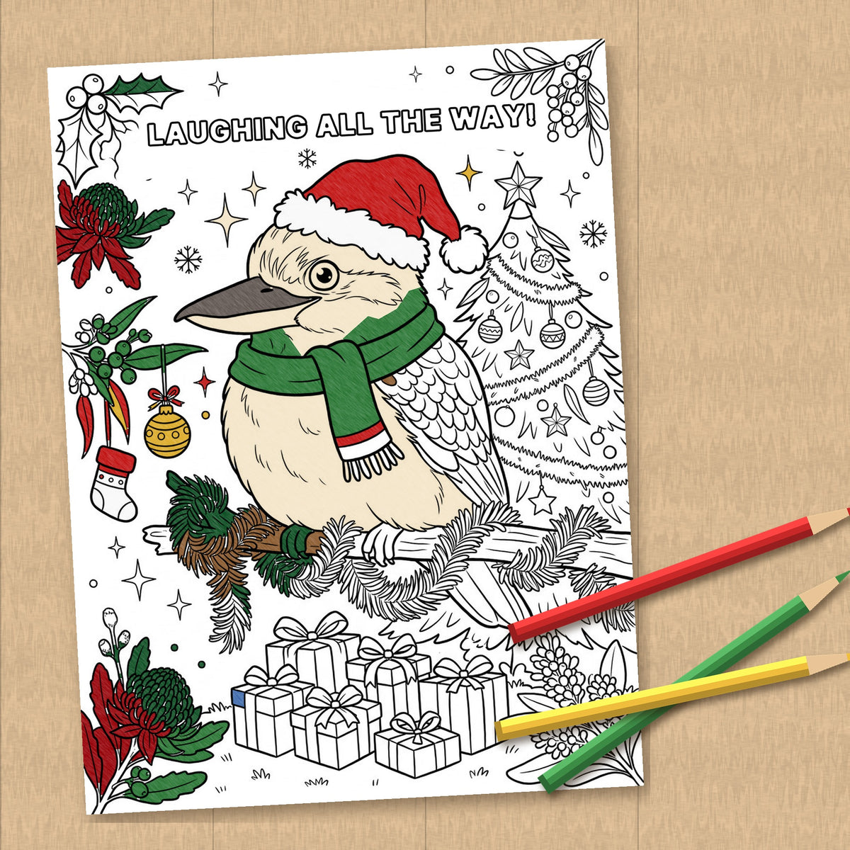 Half-coloured "Laughing All the Way!" colouring page of a kookaburra in a Santa hat and green scarf, with coloured pencils
