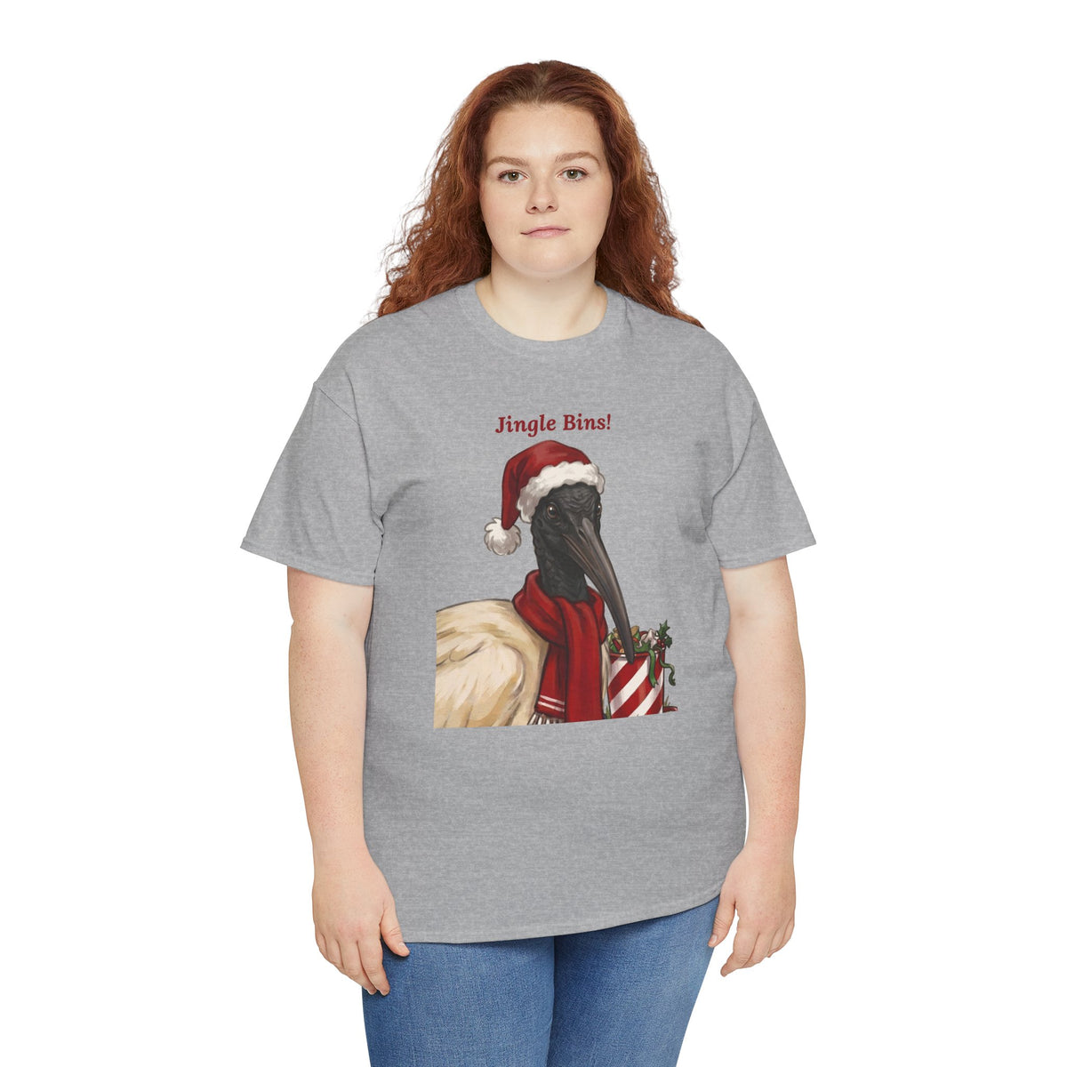 Gray crewneck t-shirt on model with “Jingle Bins!” Santa bird illustration