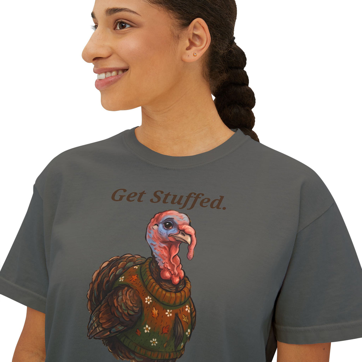Dark gray crewneck T-shirt with "Get Stuffed." turkey graphic, close-up.