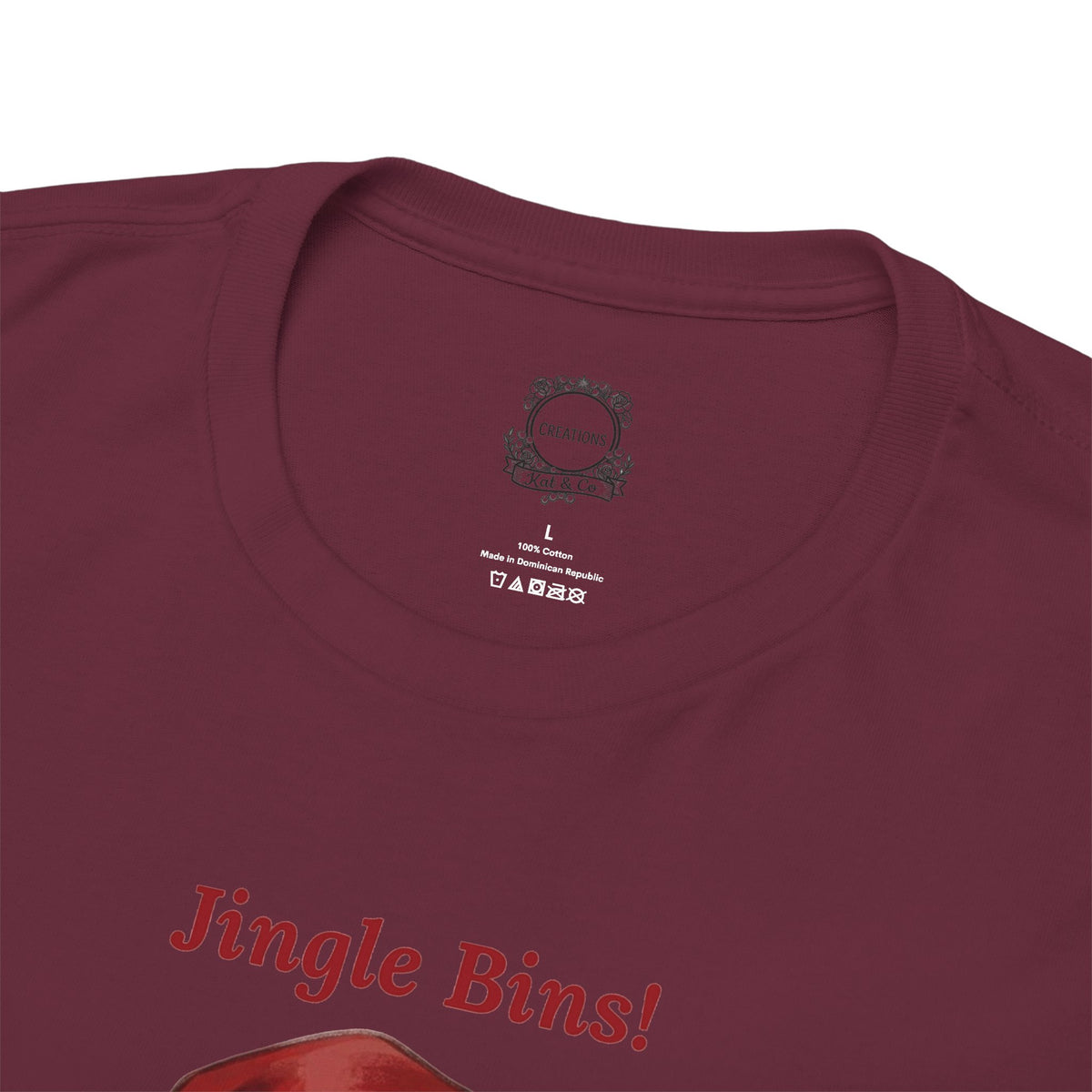 Maroon T-shirt close-up of neck logo and “Jingle Bins!” text on the chest.