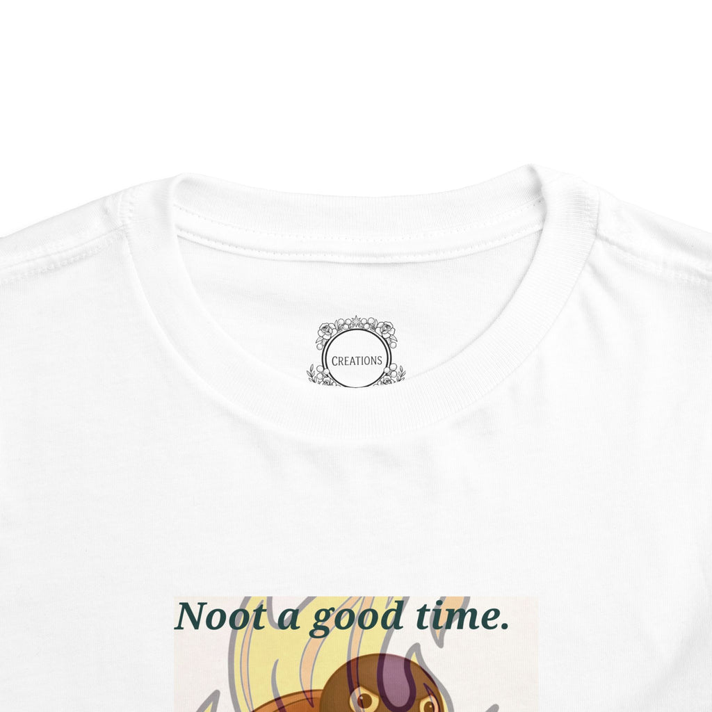 White toddler T-shirt neckline close-up with partial cat-in-flames graphic
