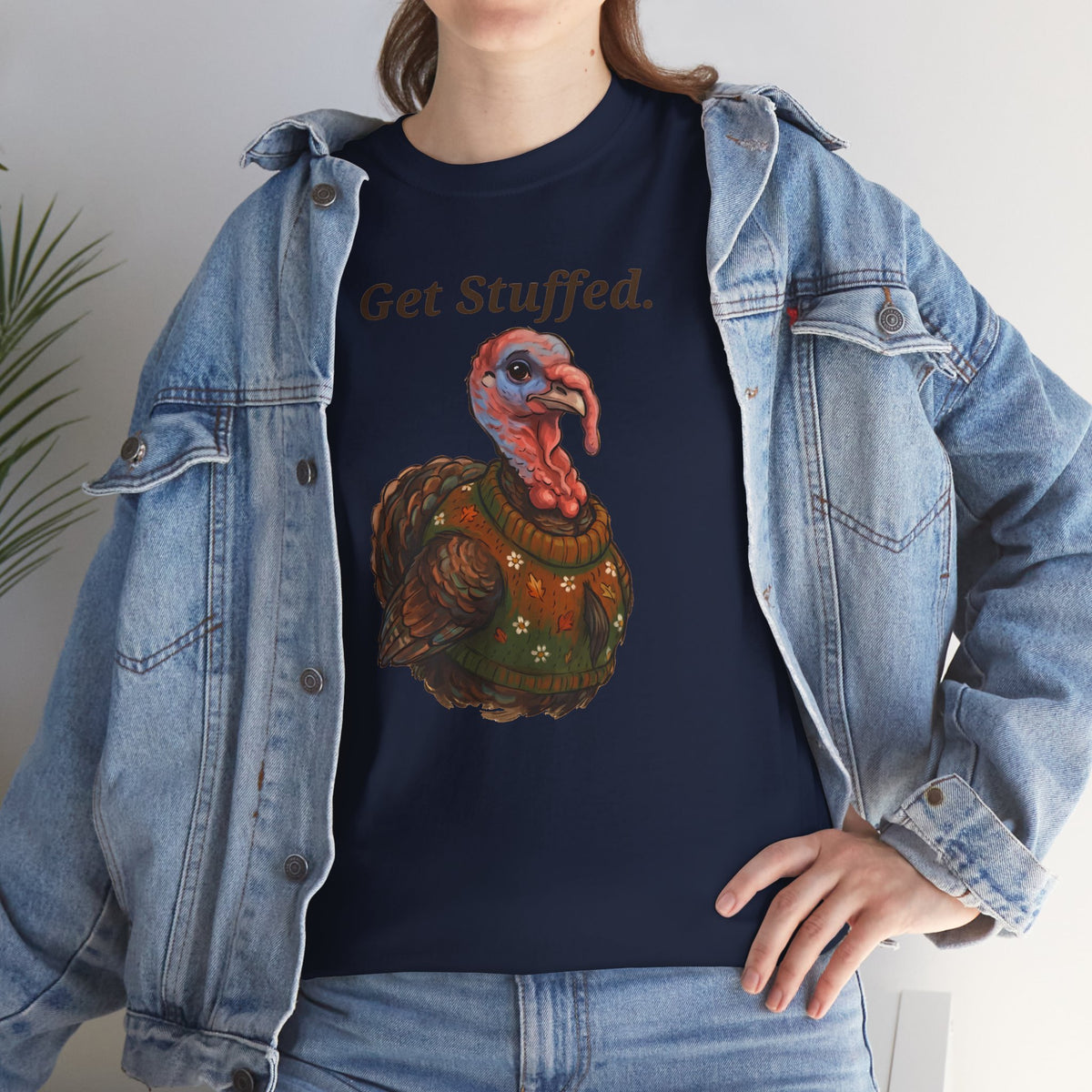 Navy Get Stuffed turkey graphic tee under a light denim jacket; front “Get Stuffed.”