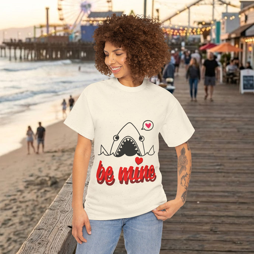 White tee with shark graphic and red 'be mine' text with heart accents.