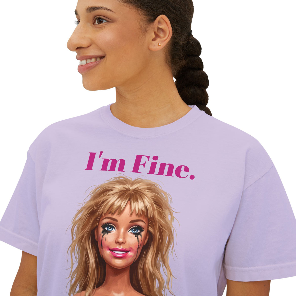 Boxy lavender graphic tee with “I'm Fine.” text and doll face print, crew neck.