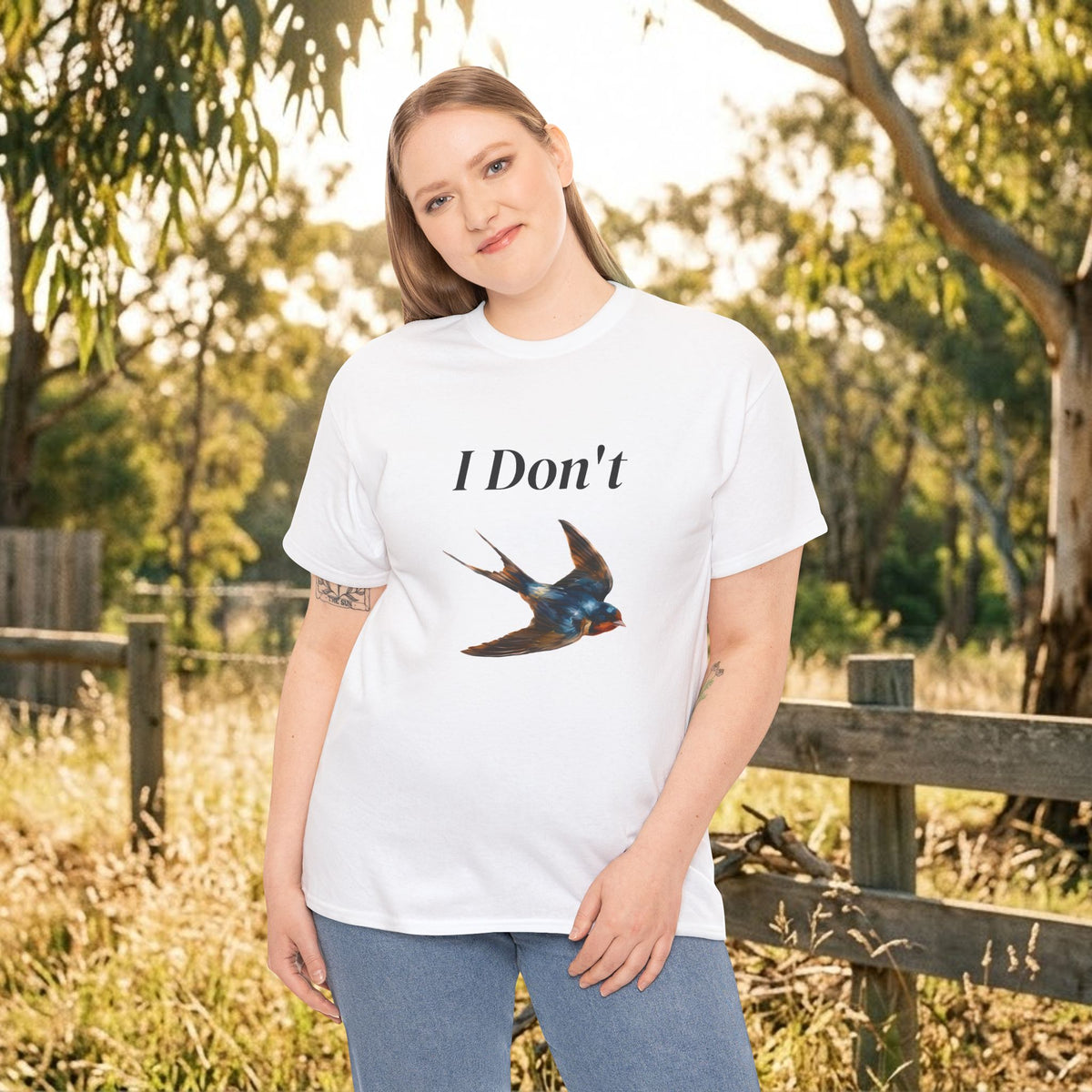 White graphic T-shirt with “I Don’t” text and bird illustration on the chest