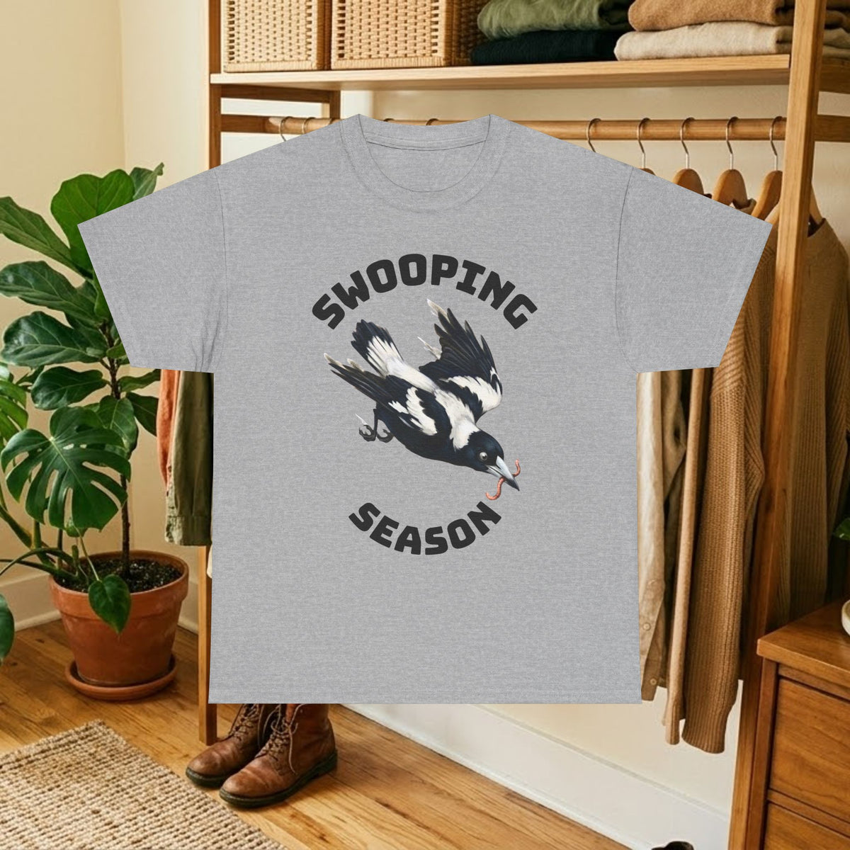 Light gray t-shirt with black bird graphic and "SWOOPING SEASON" text