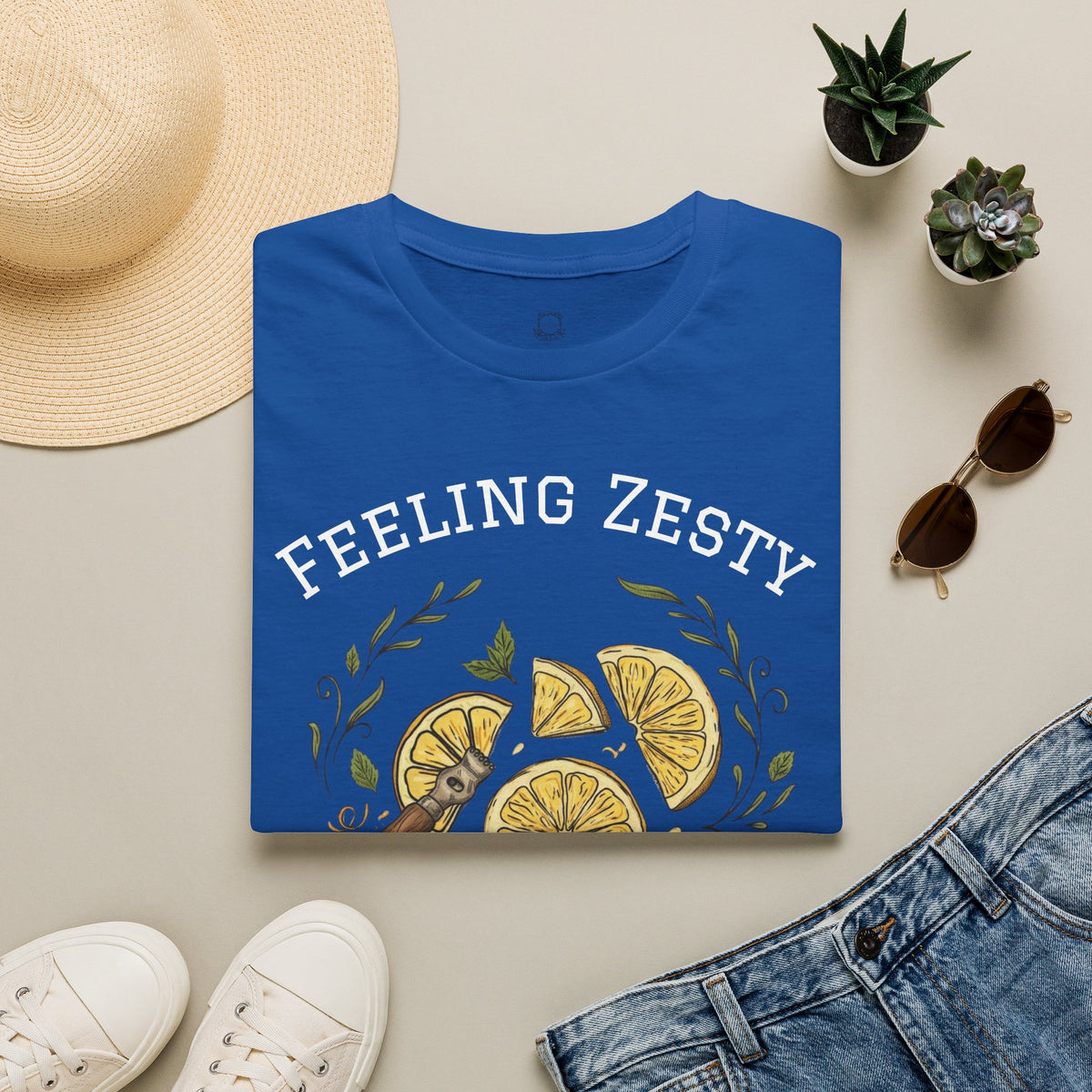 Blue crewneck t-shirt with “FEELING ZESTY” and lemon slice graphic