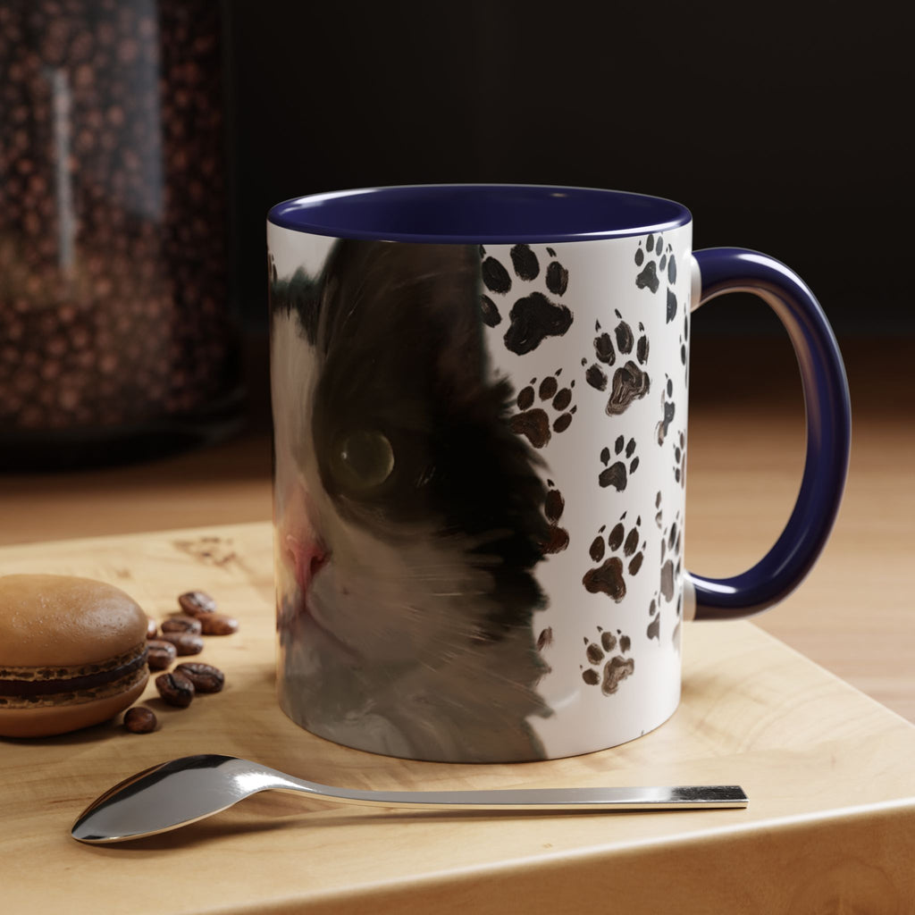 Cat face paw print accent coffee mug, white with black cat art, blue handle and rim