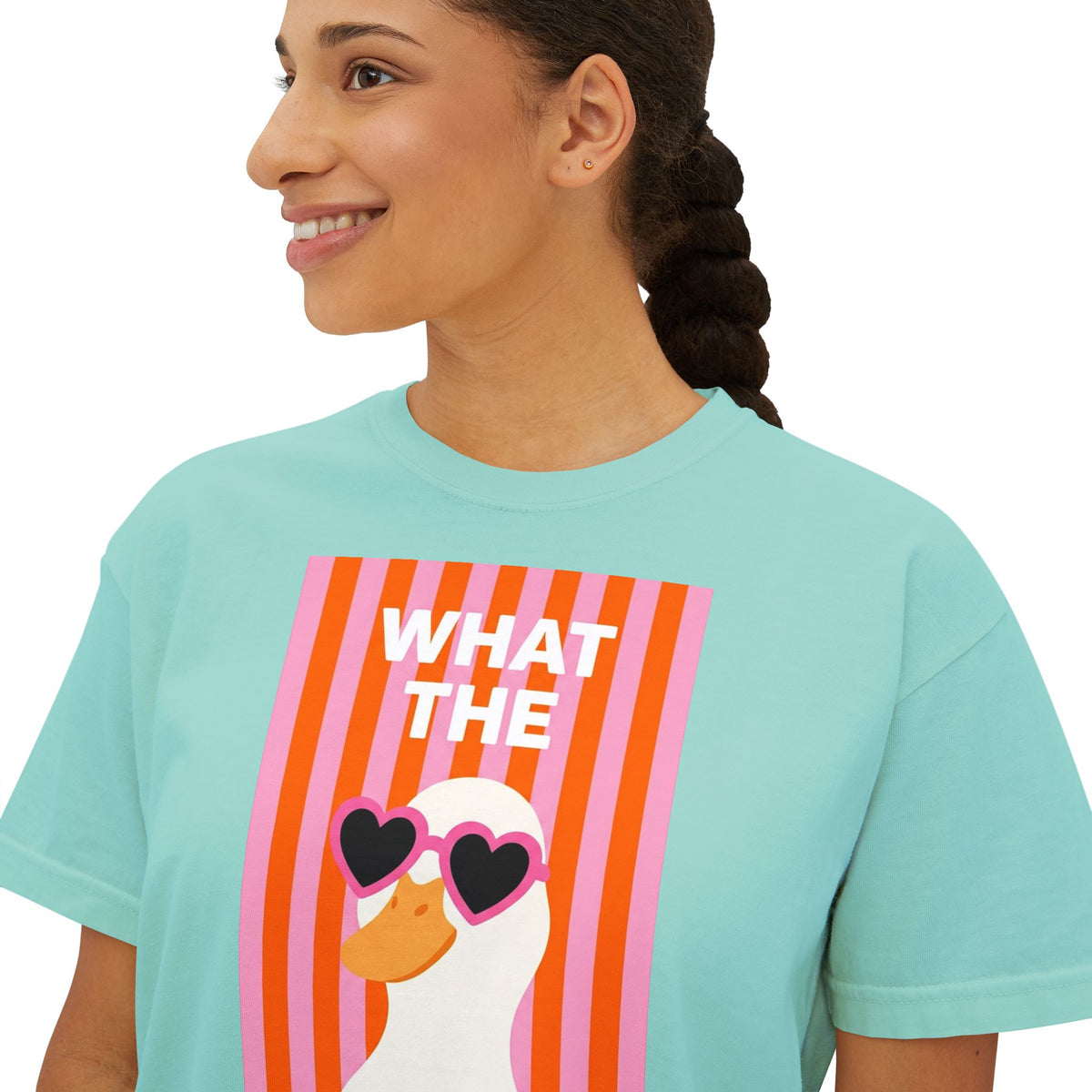 Aqua crew-neck graphic tee with “WHAT THE” text and duck wearing heart glasses