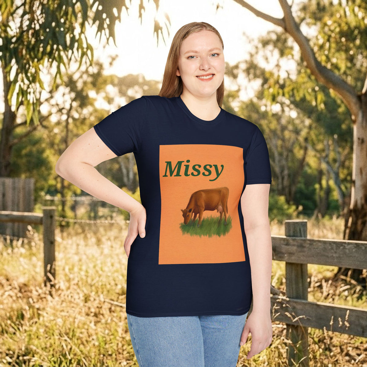 Navy women's t-shirt with orange grazing cow graphic and 'Missy' text on front