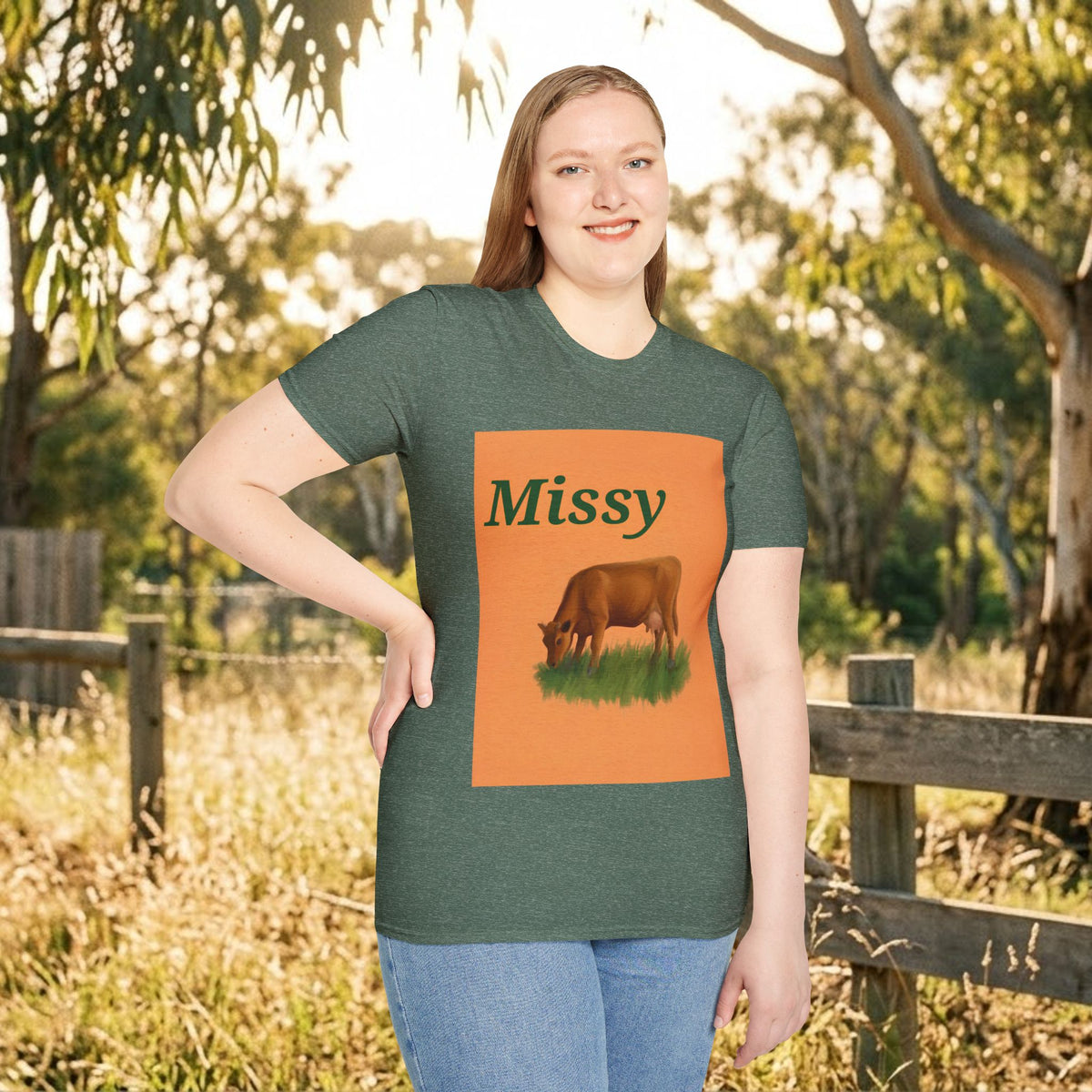 Green crewneck T-shirt with orange cow graphic panel and “Missy” text