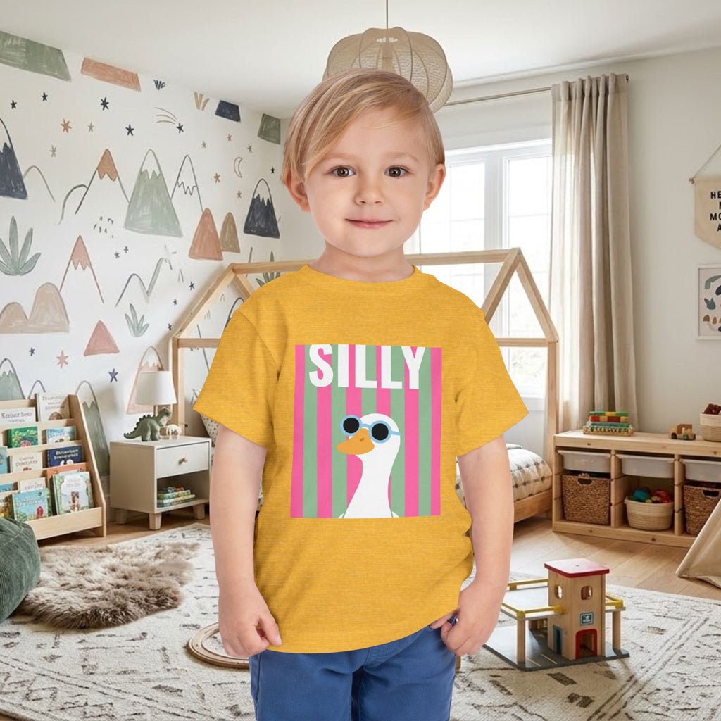 Yellow toddler tee with colorful duck sunglasses graphic and 'SILLY' text