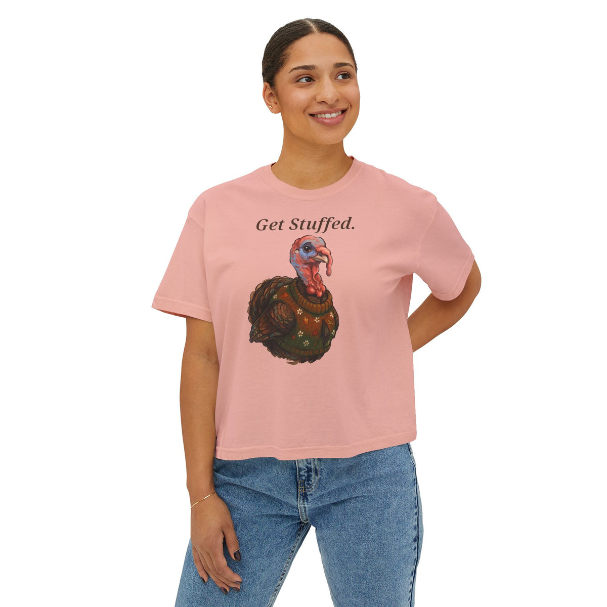 Peach crewneck T-shirt with "Get Stuffed." turkey graphic on front.
