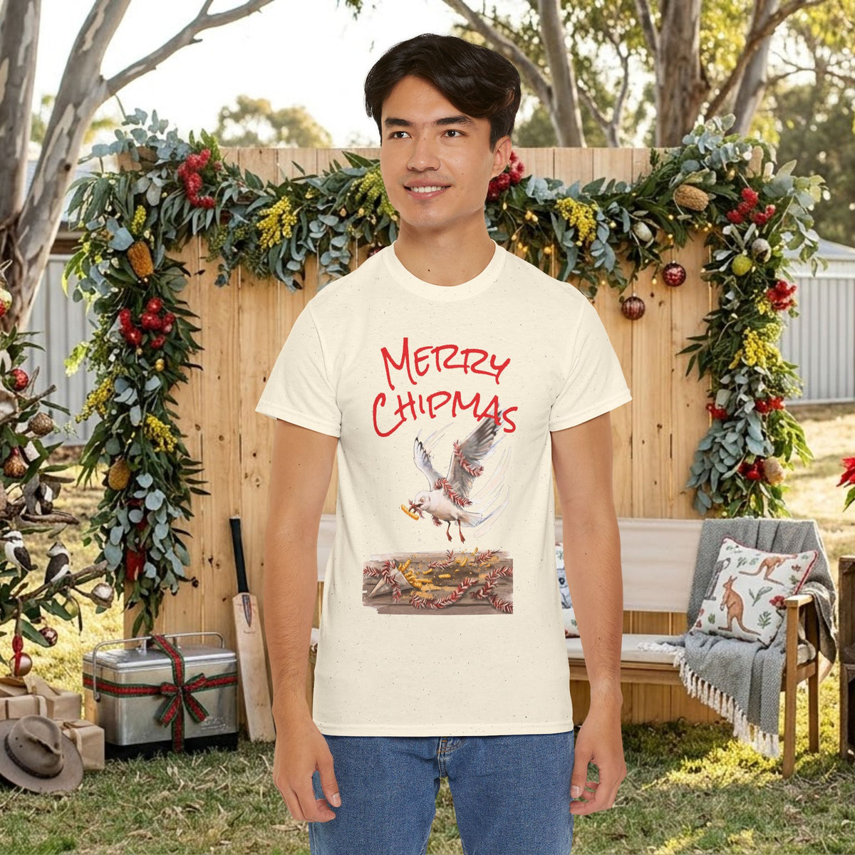 Natural/off-white tee with red “Merry Chipmas” seagull illustration on chest