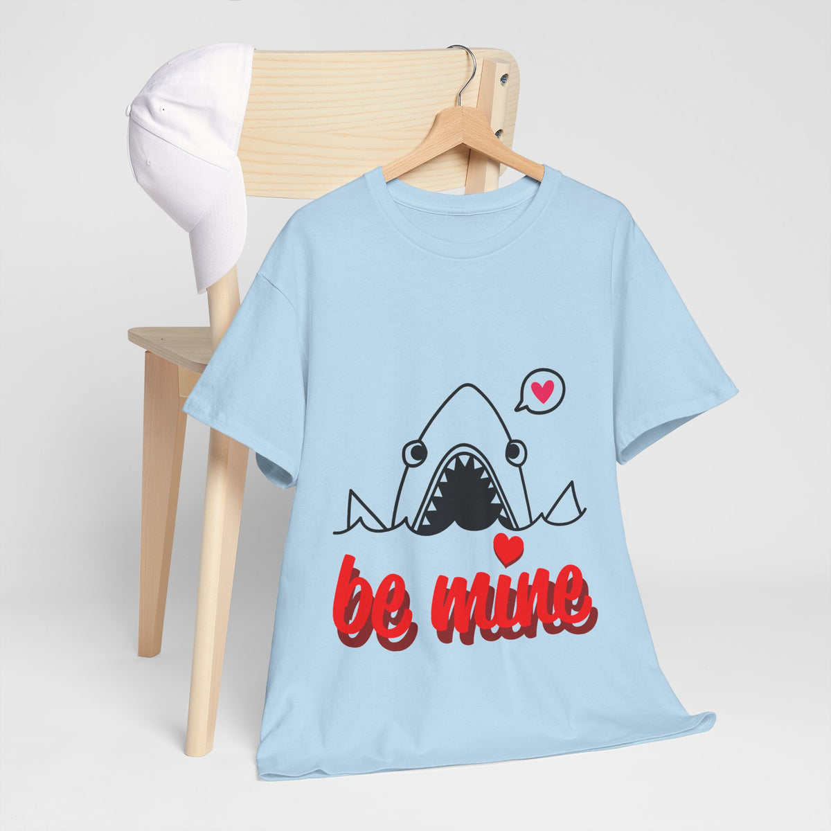 Light blue crewneck T-shirt with cartoon shark and red "be mine" print