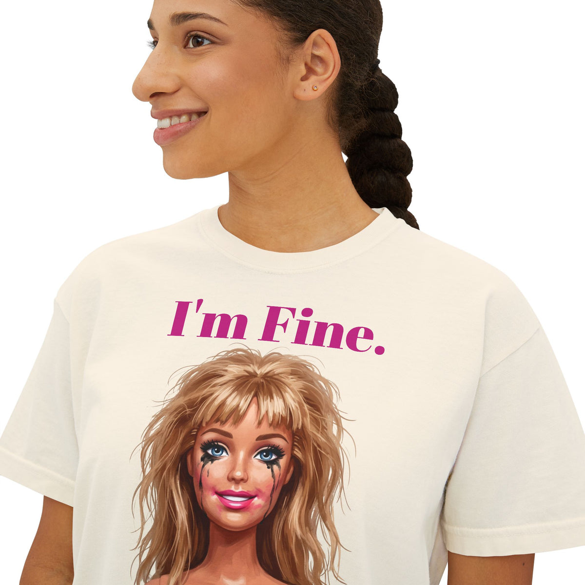 Boxy white graphic tee with “I'm Fine.” text and doll face print, crew neck.