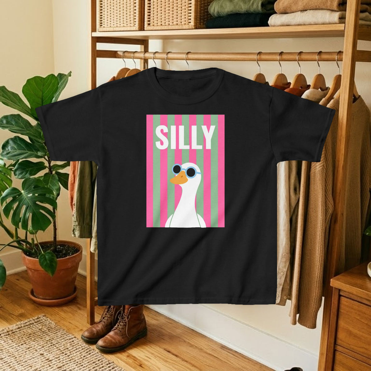 Black kids T-shirt with pink striped “SILLY” duck graphic print on the front