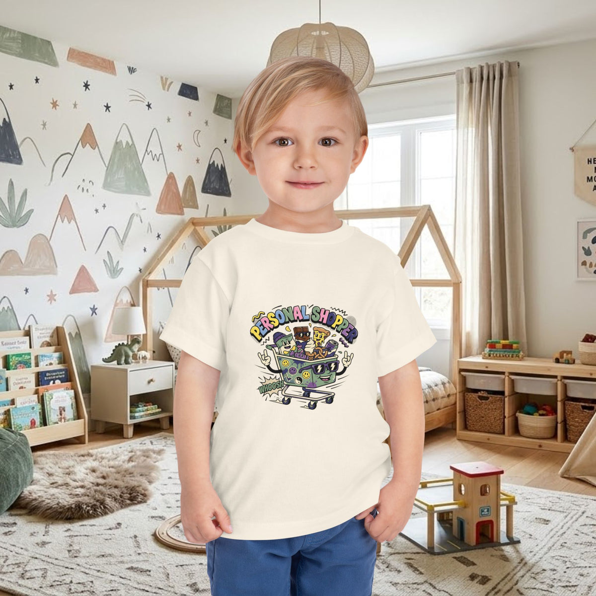 White toddler t-shirt with colorful shopping cart graphic on front