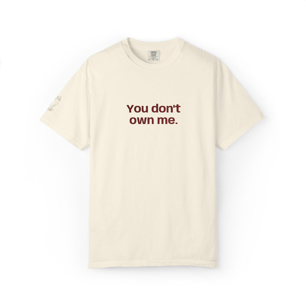 Off-white T-shirt with centered "You don't own me." slogan printed on the chest.