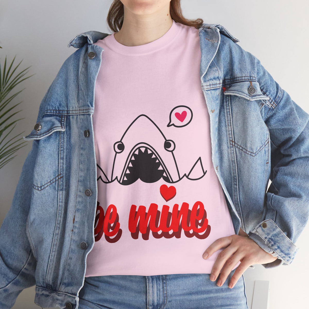 Light pink crewneck graphic T-shirt showing shark face and red “be mine” text